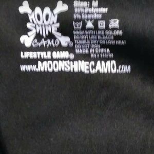 Pink Med Girl camo jacket with black in it